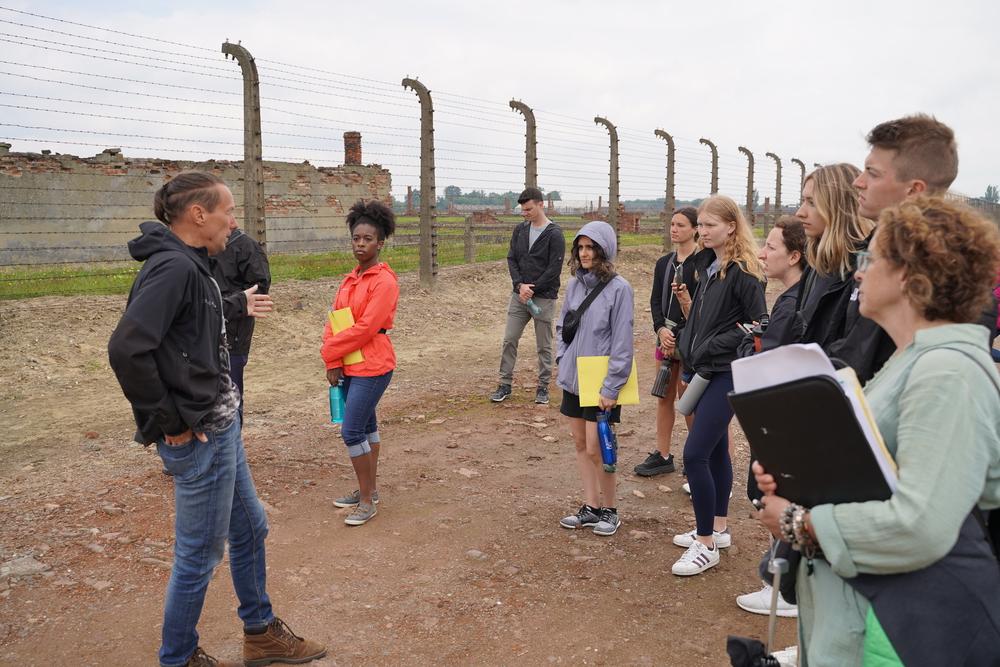 An image of the OUWB cohort at Auschwitz-Birkenau in 2022